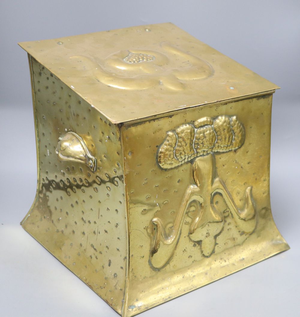 An Art Nouveau brass coal scuttle, height 33cm